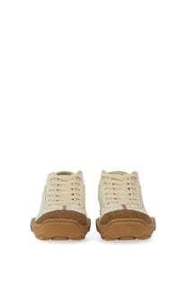 Cream-colored suede fendi men’s fendi lab sneaker with textured brown rubber sole and subtle red stitching details