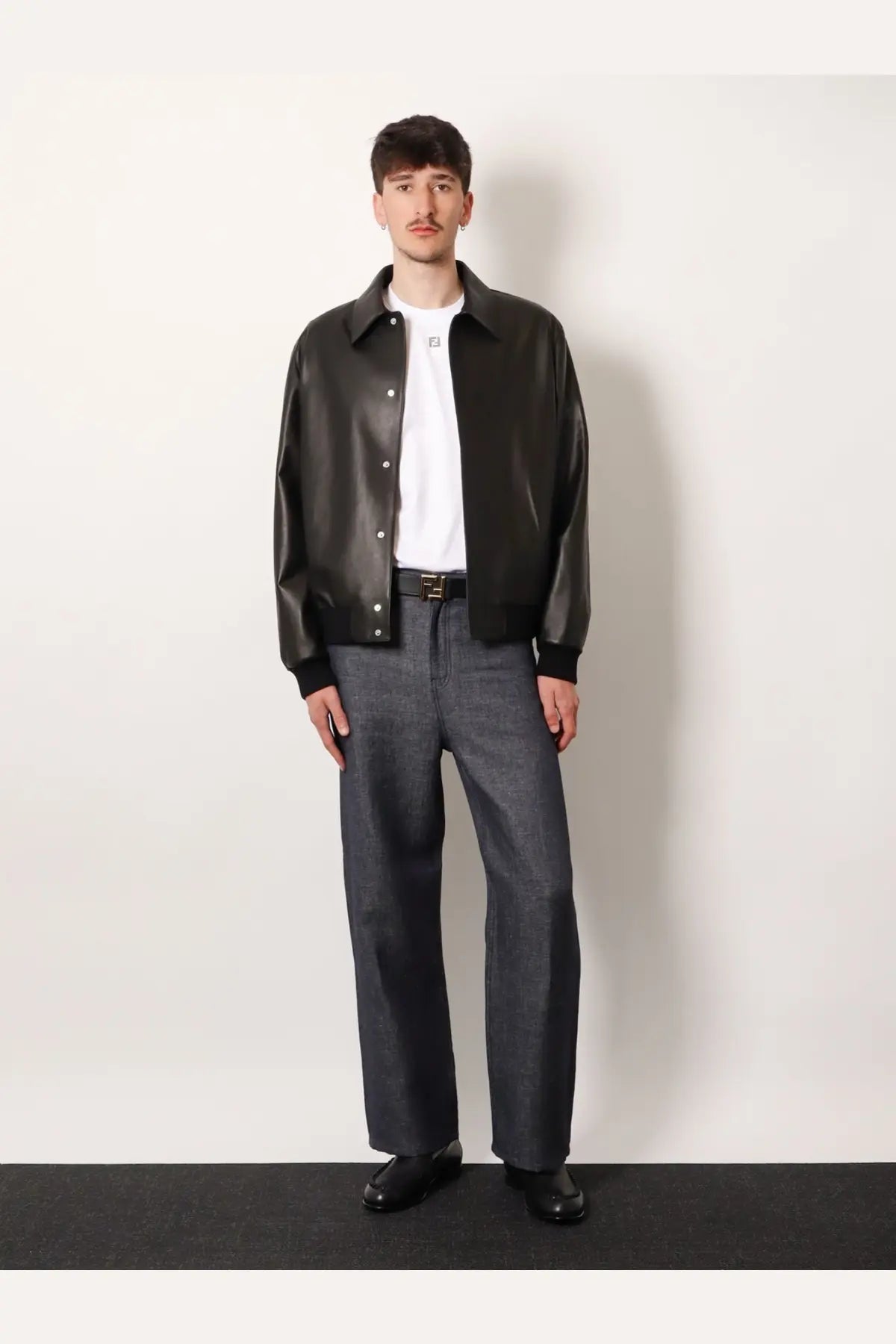 Fendi men’s black leather bomber jacket with classic collar and button closure designed for stylish outerwear
