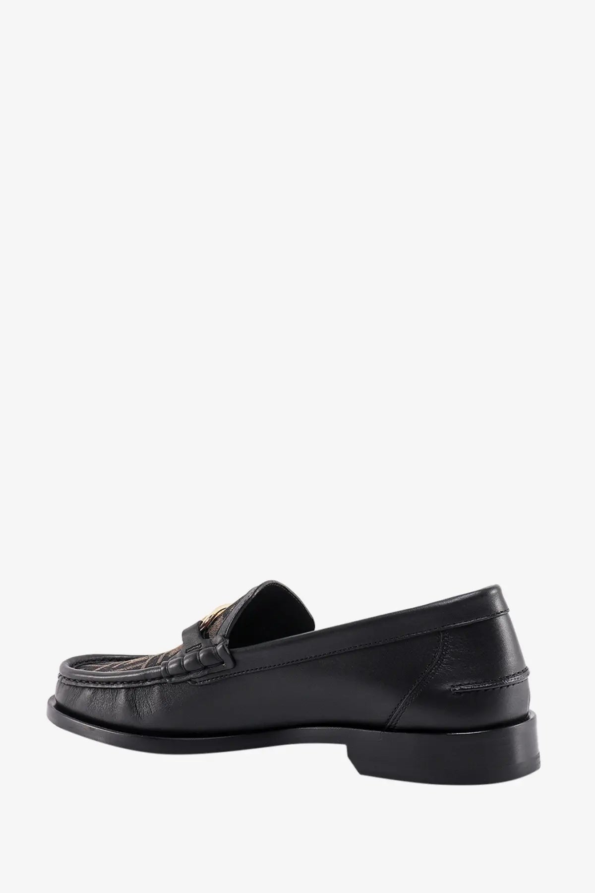 Black leather men’s loafer by Fendi with gold-tone metal buckle and subtle embossed detailing on toe