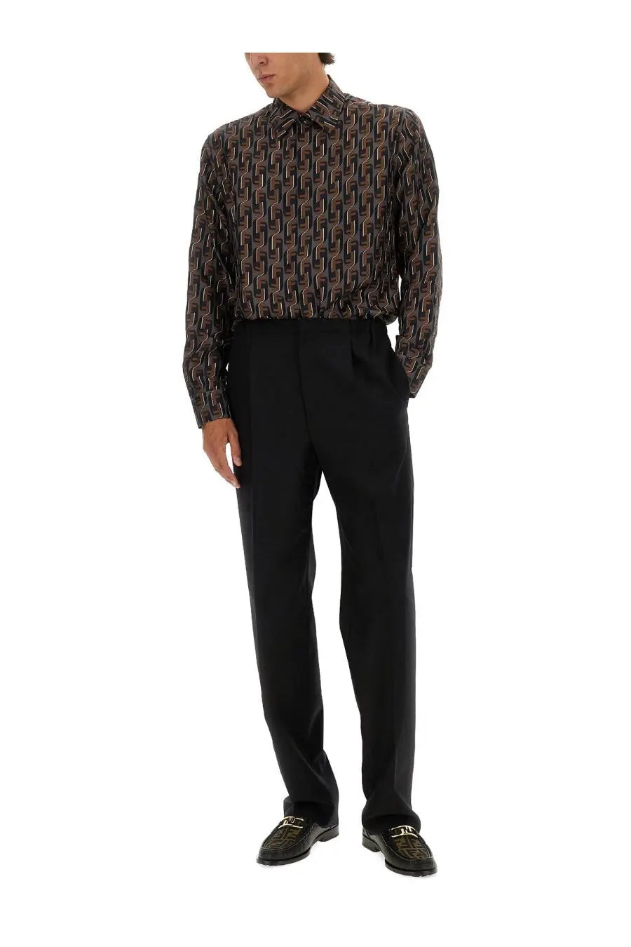 Black tailored trousers paired with fendi men’s printed silk shirt blue for a sleek modern look