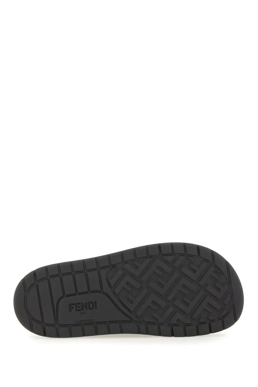 Black rubber sole of fendi men’s slide sandal with embossed fendi logo pattern and brand name visible