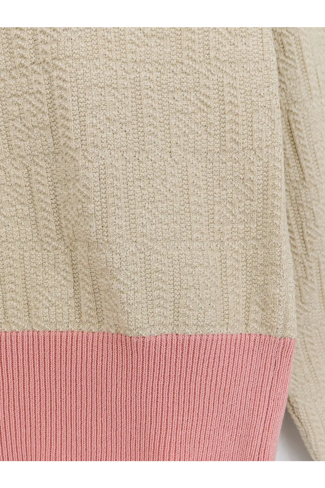Fendi women’s cotton and silk sweater in beige and pink with a ribbed cable-knit textured pattern