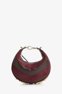 Fendi women’s fendigraphy mini leather handbag in brown featuring a maroon and brown chevron-patterned suede hobo bag with gold hardware