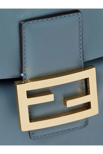Fendi women’s leather backpack grey featuring a gold-tone fendi logo clasp on light blue leather side detail
