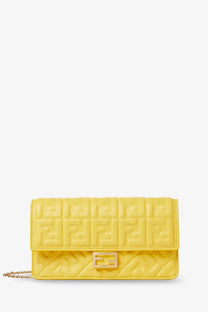 Bright yellow fendi clutch with quilted ff logo pattern and gold-tone metal clasp.
