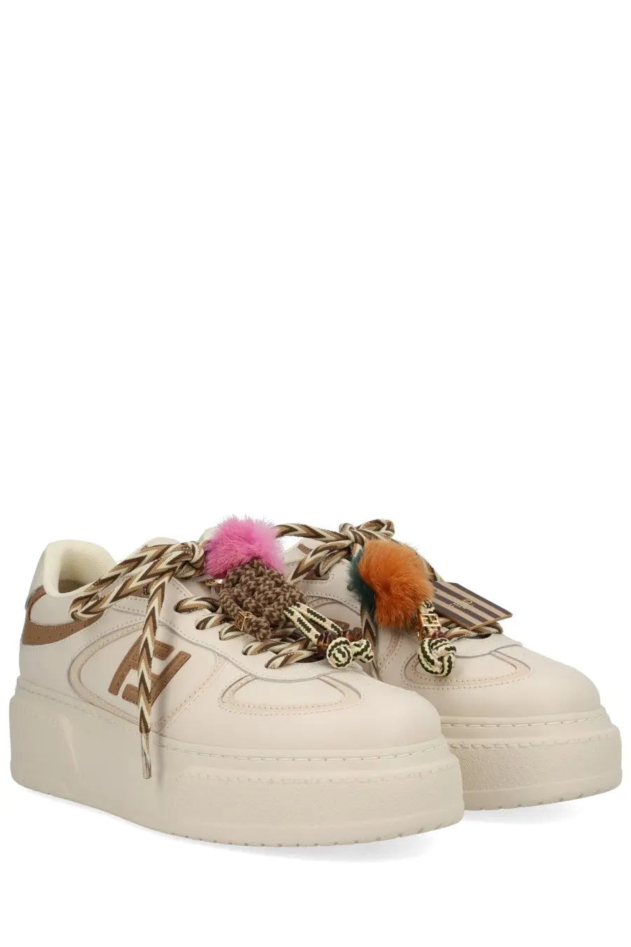 Cream-colored fendi women’s platform sneakers with braided gold-tone laces and colorful pom-pom tassels