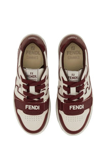 Fendi women’s match sneaker in white and maroon with bold branding on sides tongue and heel in leather and mesh