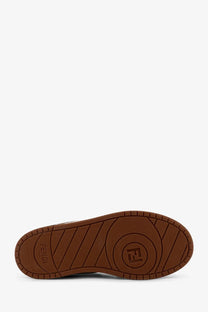 Brown rubber sole with embossed fendi logo and circular pattern on fendi womens suede and pony skin black sneakers