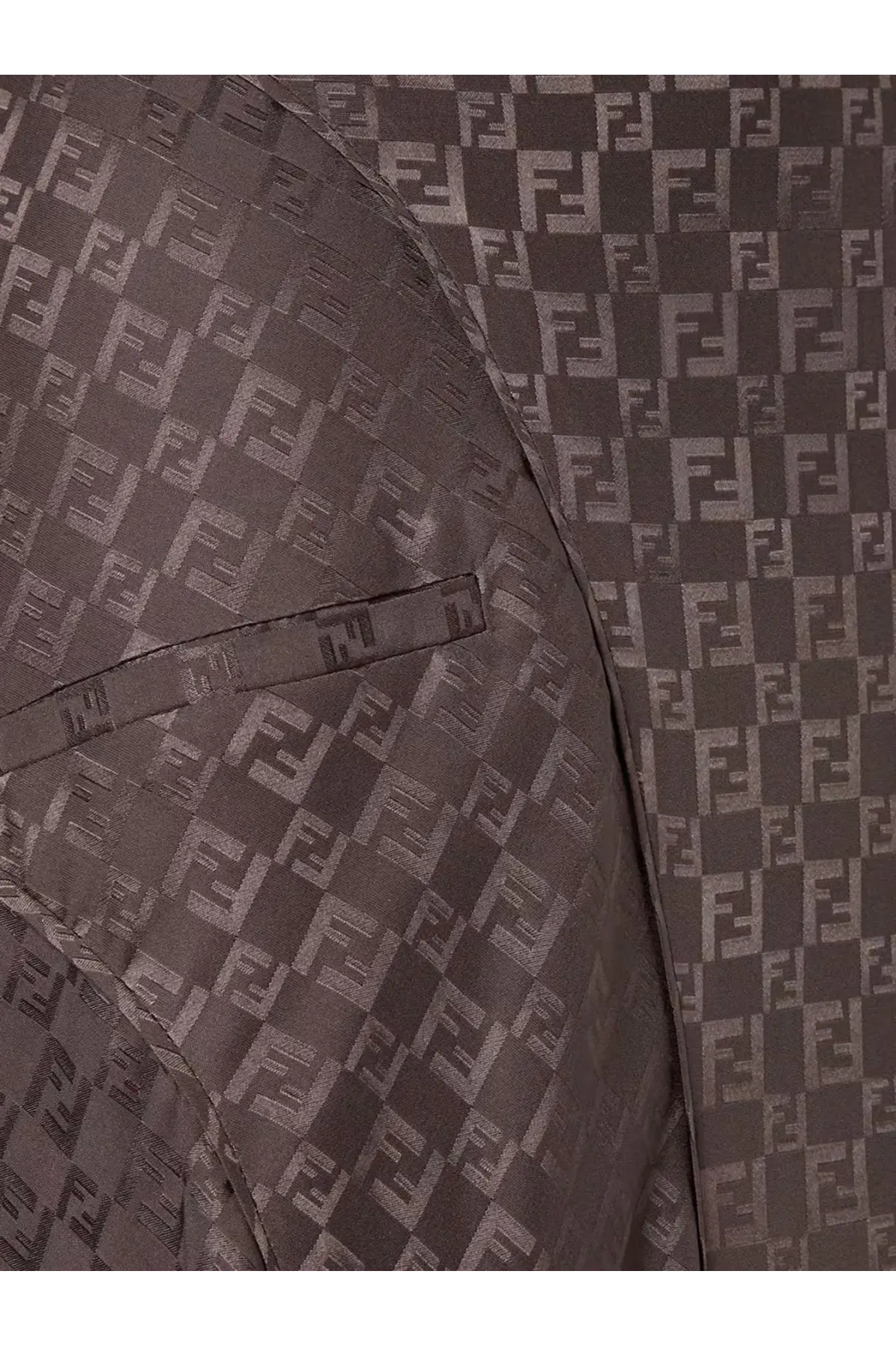 Brown Fendi jacket with repeating FF logo pattern paired with Fendi women’s midi FF jacquard silk skirt in brown