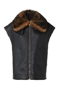 Fendi women’s black sheepskin leather sleeveless vest with plush brown fur collar and front zipper closure