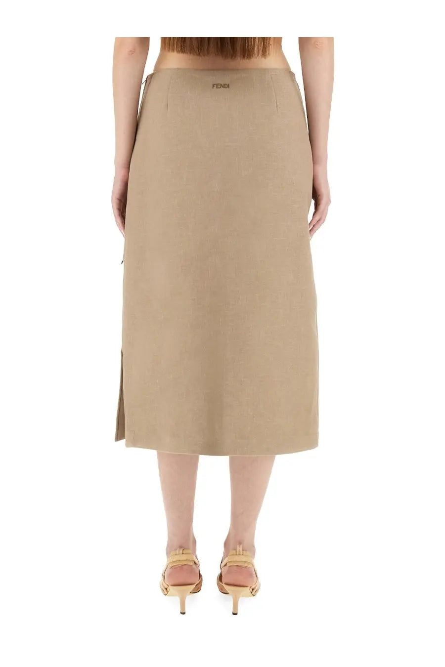 A beige fendi women’s waxed linen midi skirt with a sleek straight cut and subtle side slit