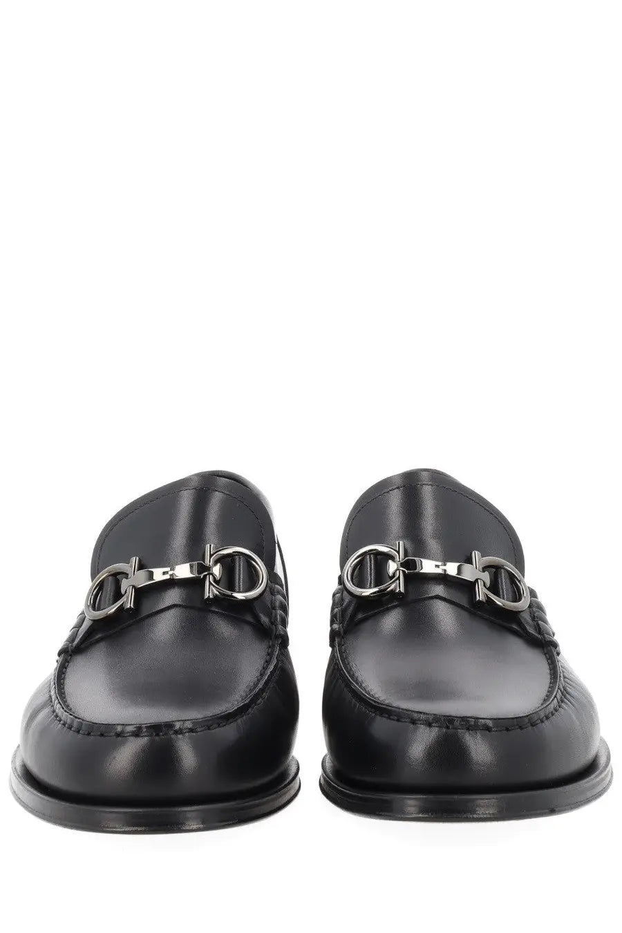 Ferragamo men’s moccasin black leather loafers with a signature silver-toned horsebit buckle front view
