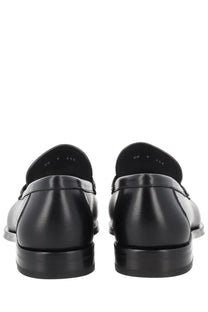 Ferragamo men’s moccasin gancini black leather loafers with a sleek polished finish and classic slip-on design
