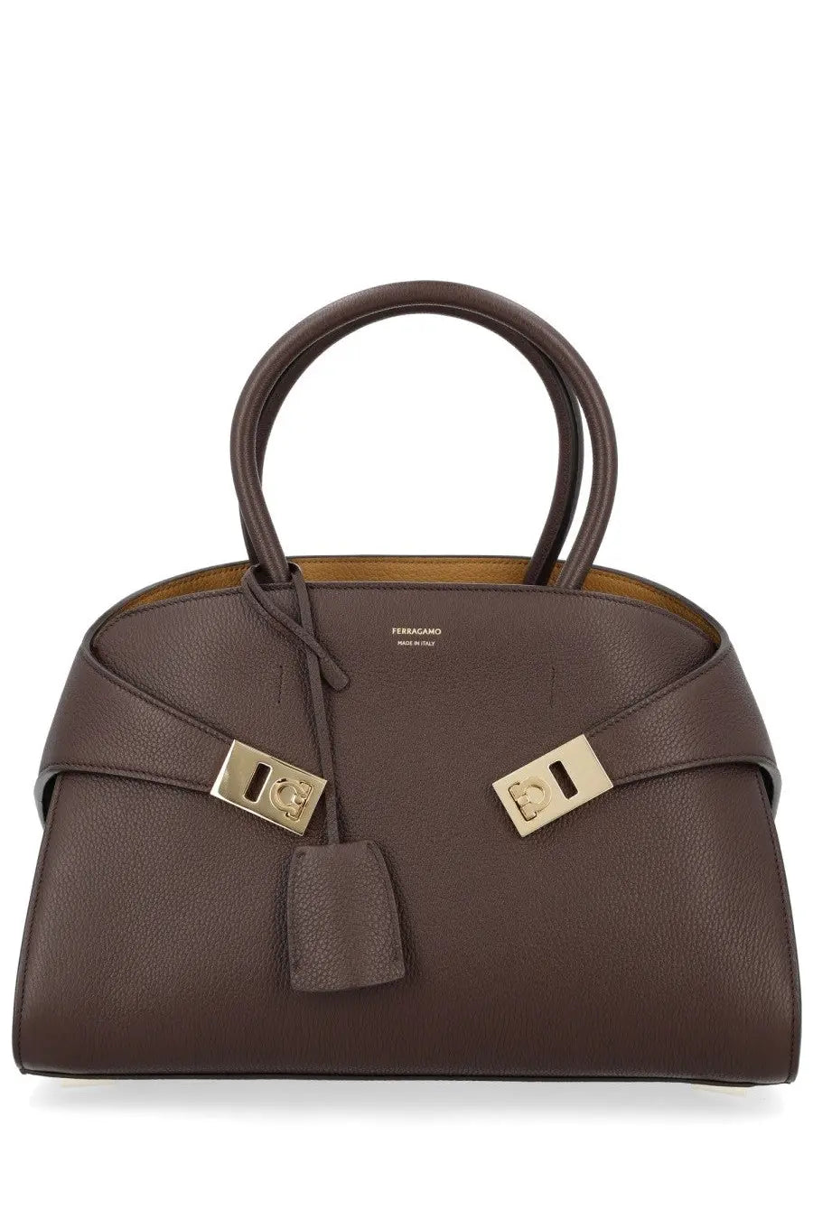 Ferragamo women’s borsa hug medium brown leather handbag with gold-tone hardware and tassel detail