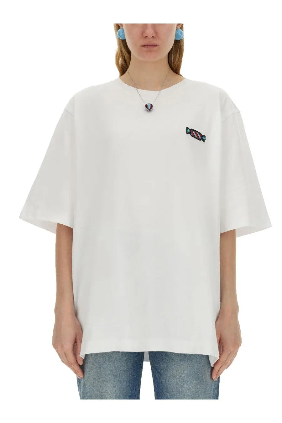 White oversized cotton t-shirt with colorful embroidered candy patch on left chest from Fiorucci women’s collection