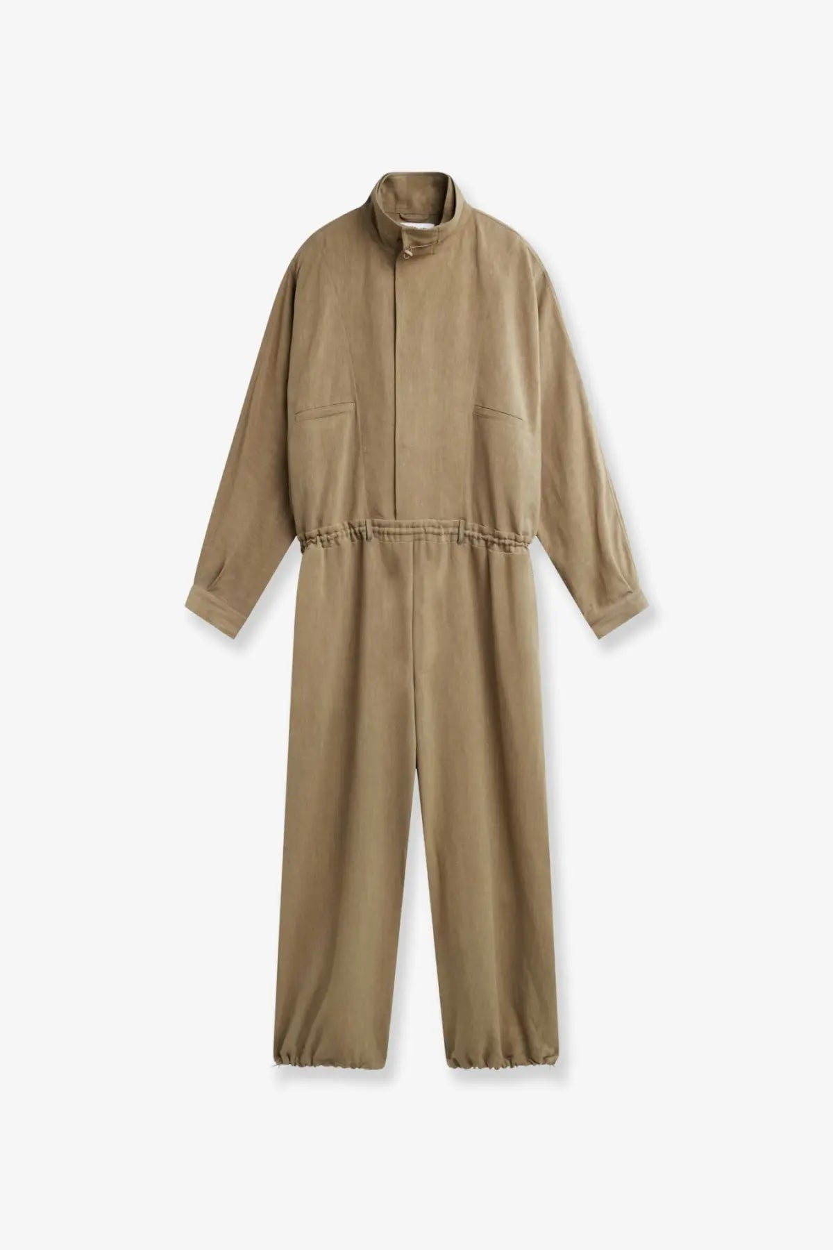 Tan utility jumpsuit with high collar elasticated waistband and cuffs made of viscose and linen by the frankie shop
