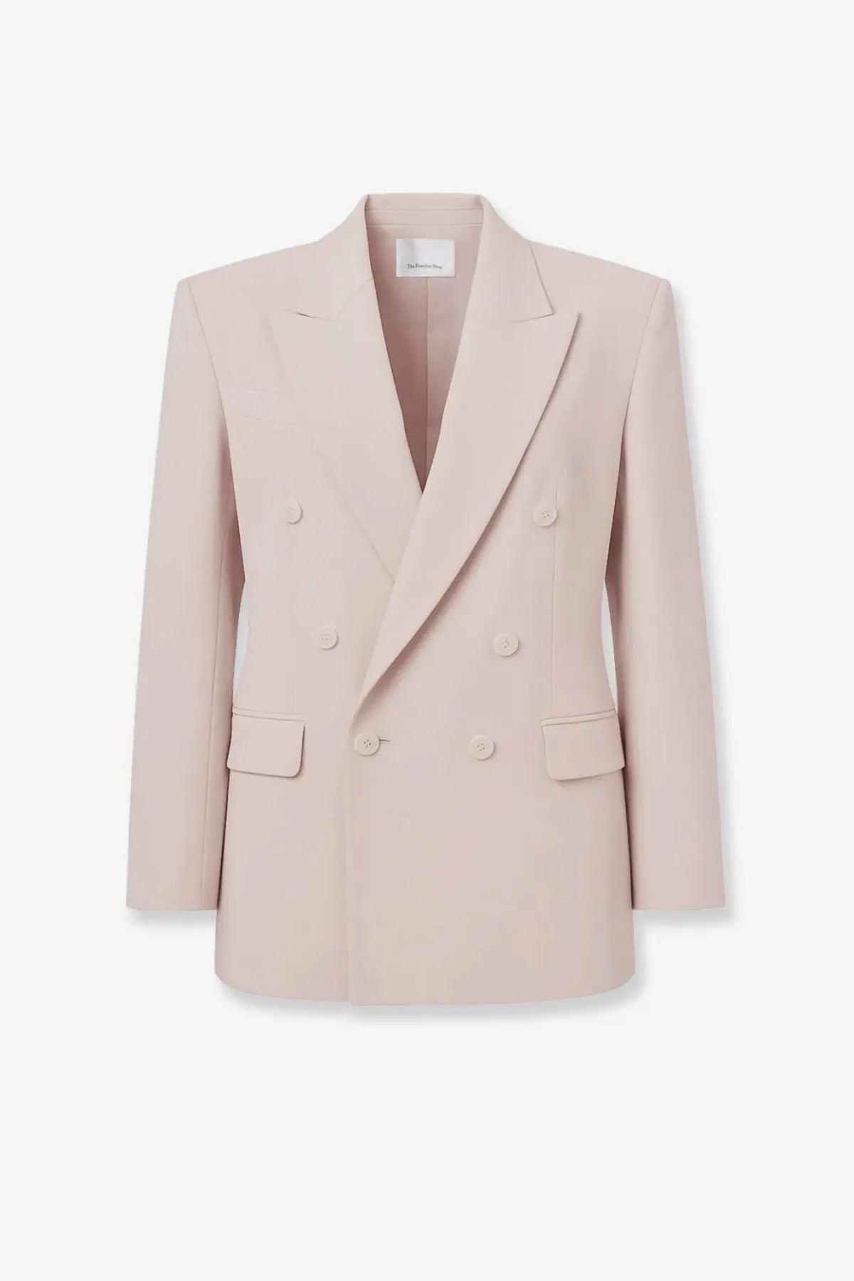 A soft blush pink double-breasted tailored wool blend blazer with classic notched lapels from the frankie shop