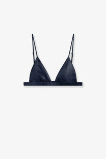 The Frankie Shop women’s Nina satin bralette in navy blue features a triangle shape with thin adjustable straps
