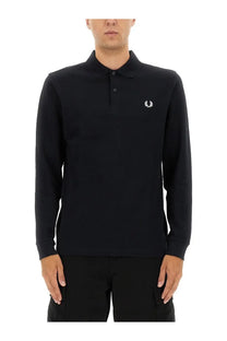 Black long-sleeved cotton polo shirt with white embroidered laurel wreath logo by Fred Perry for men