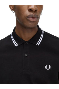 Black Fred Perry men’s polo shirt with white contrast trim and embroidered laurel logo in cotton fabric