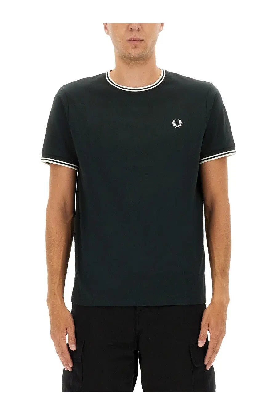 Black fred perry t-shirt with white collar and cuff trim and small embroidered logo on the chest