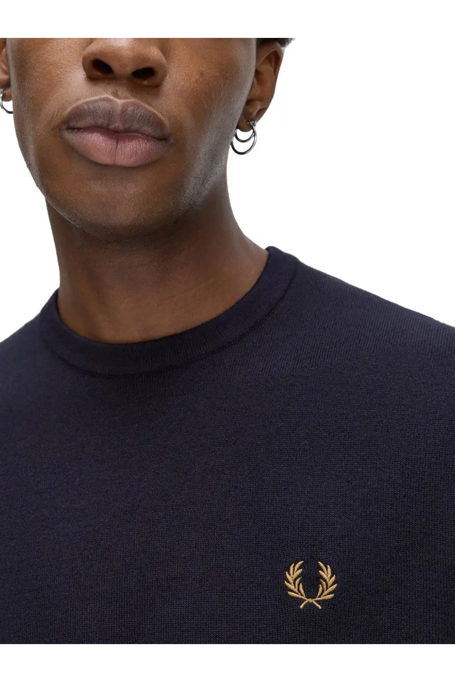 Navy blue Fred Perry men’s knit crew neck sweater with gold embroidered laurel wreath logo in jersey fabric