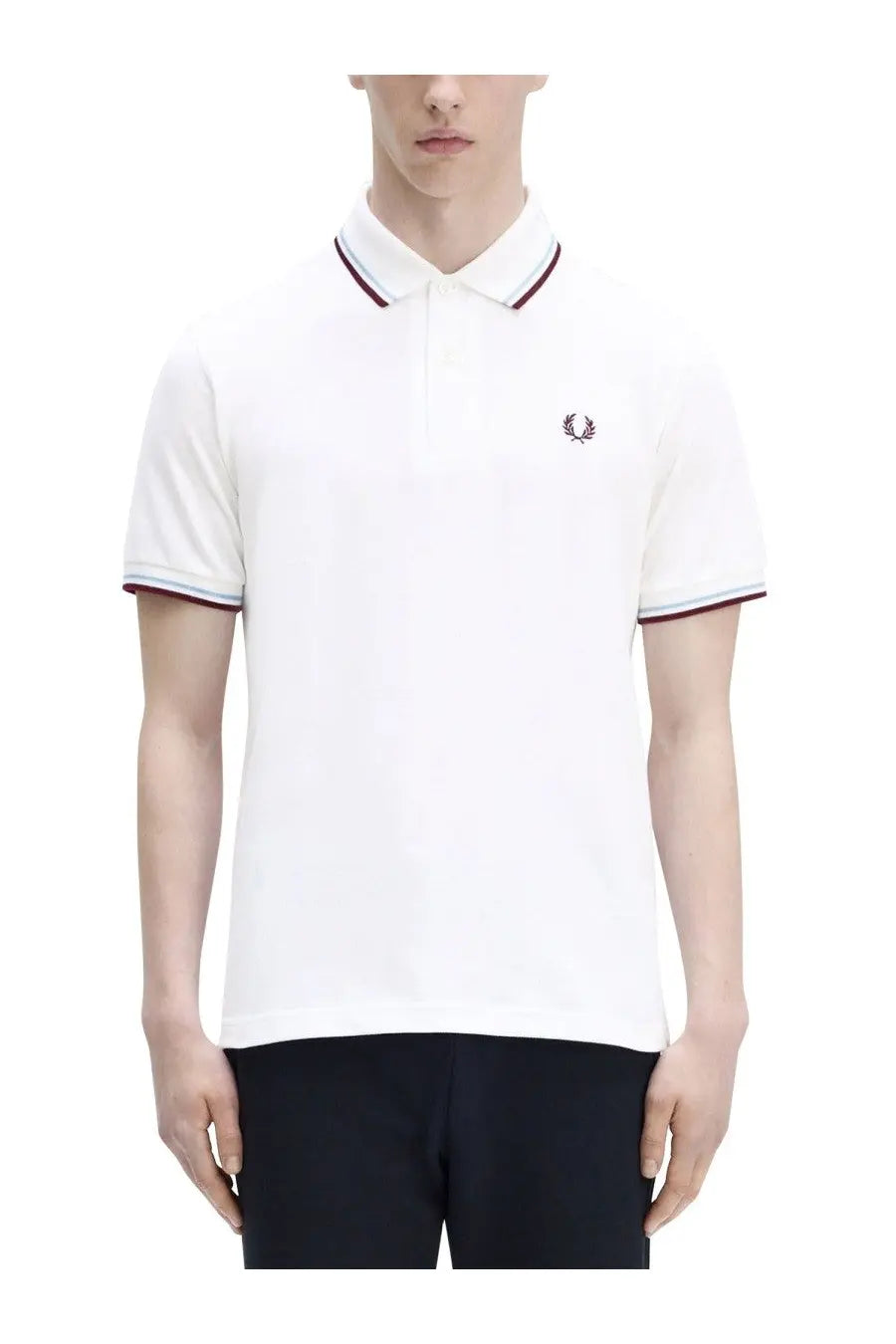Fred Perry men’s white M12 polo shirt with navy and red trim and embroidered laurel wreath logo on chest