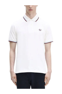 Fred Perry men’s white M12 polo shirt with navy and red trim and embroidered laurel wreath logo on chest