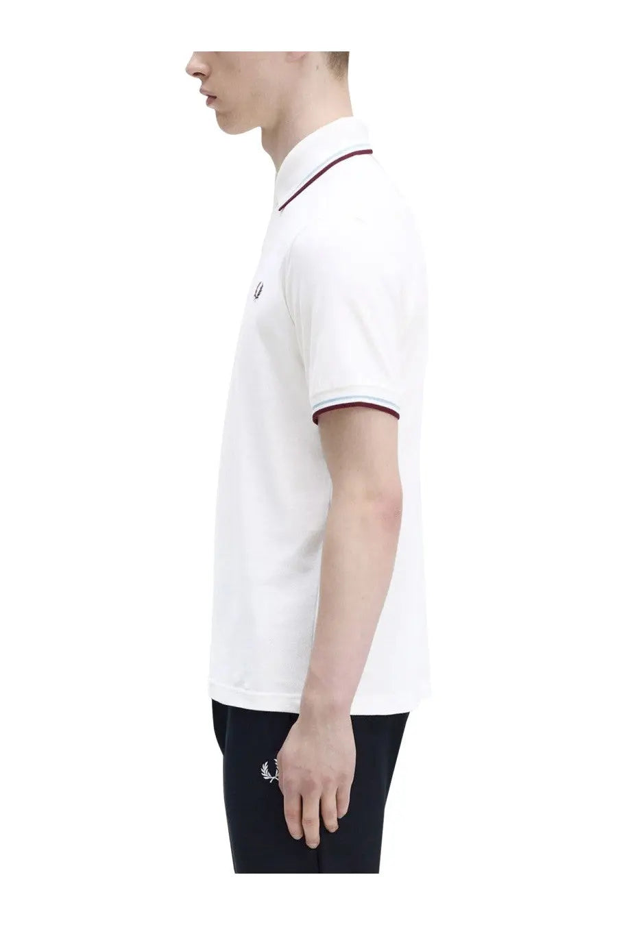Fred Perry men’s white polo shirt with maroon trim and small embroidered logo on chest in cotton material