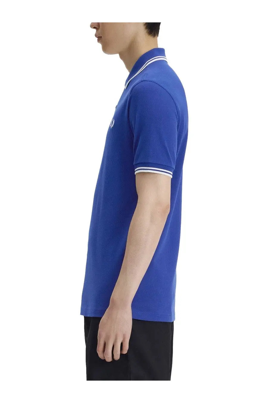 Fred Perry men’s royal blue polo shirt with white trim on collar and sleeve cuffs for casual wear