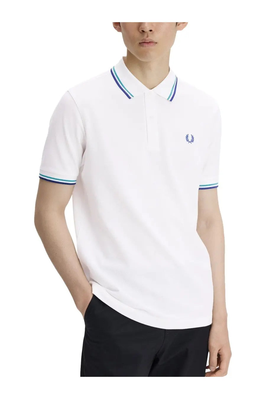 Fred Perry men’s white polo shirt with navy and light blue striped trim and embroidered laurel wreath logo on chest