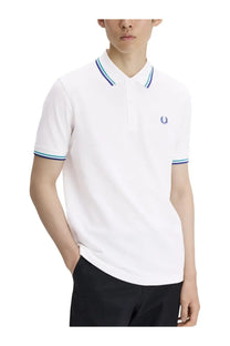Fred Perry men’s white polo shirt with navy and light blue striped collar and sleeves and laurel wreath logo on chest