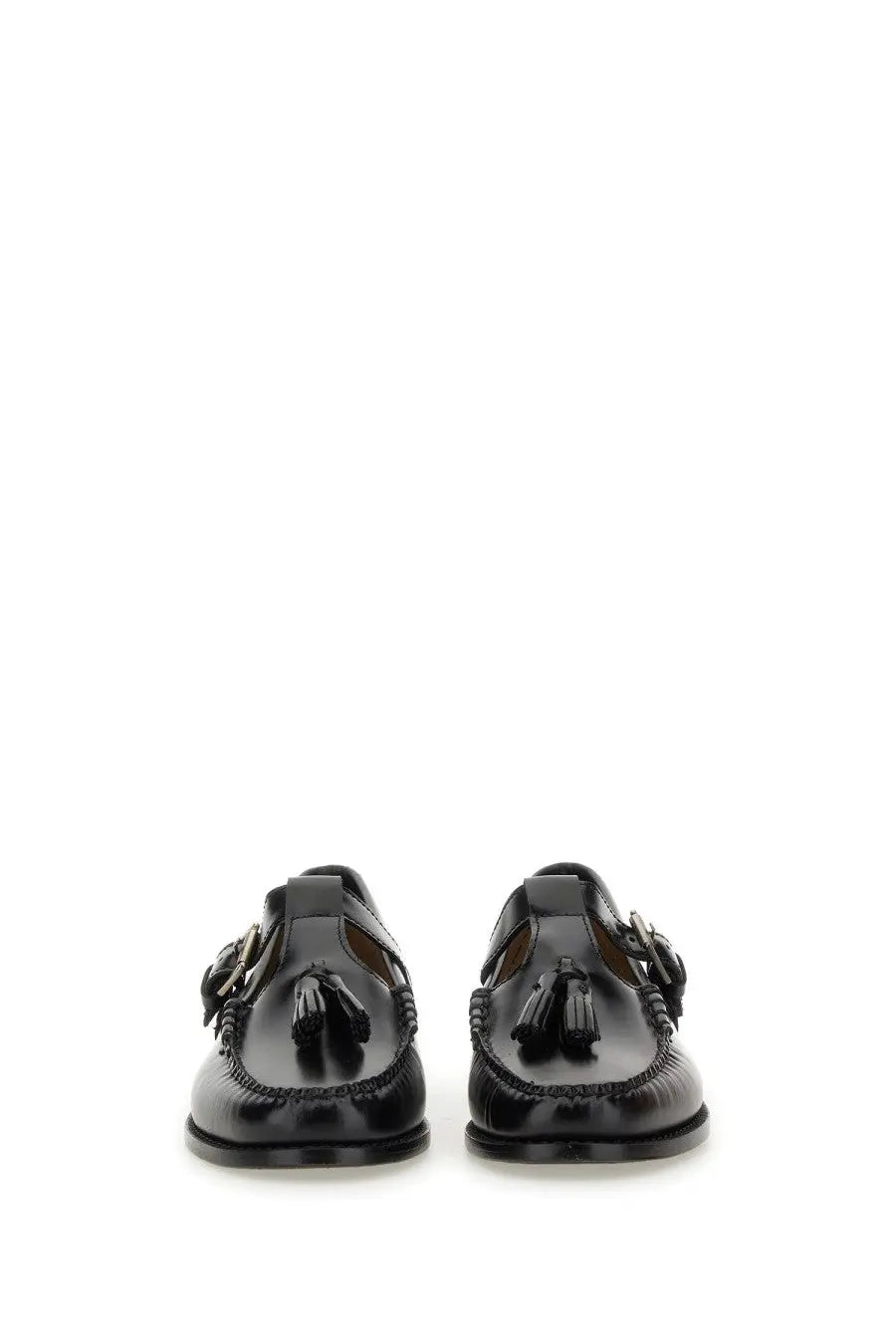 Black leather loafers for women by G.H. Bass featuring tassels and buckle details in classic mary jane style