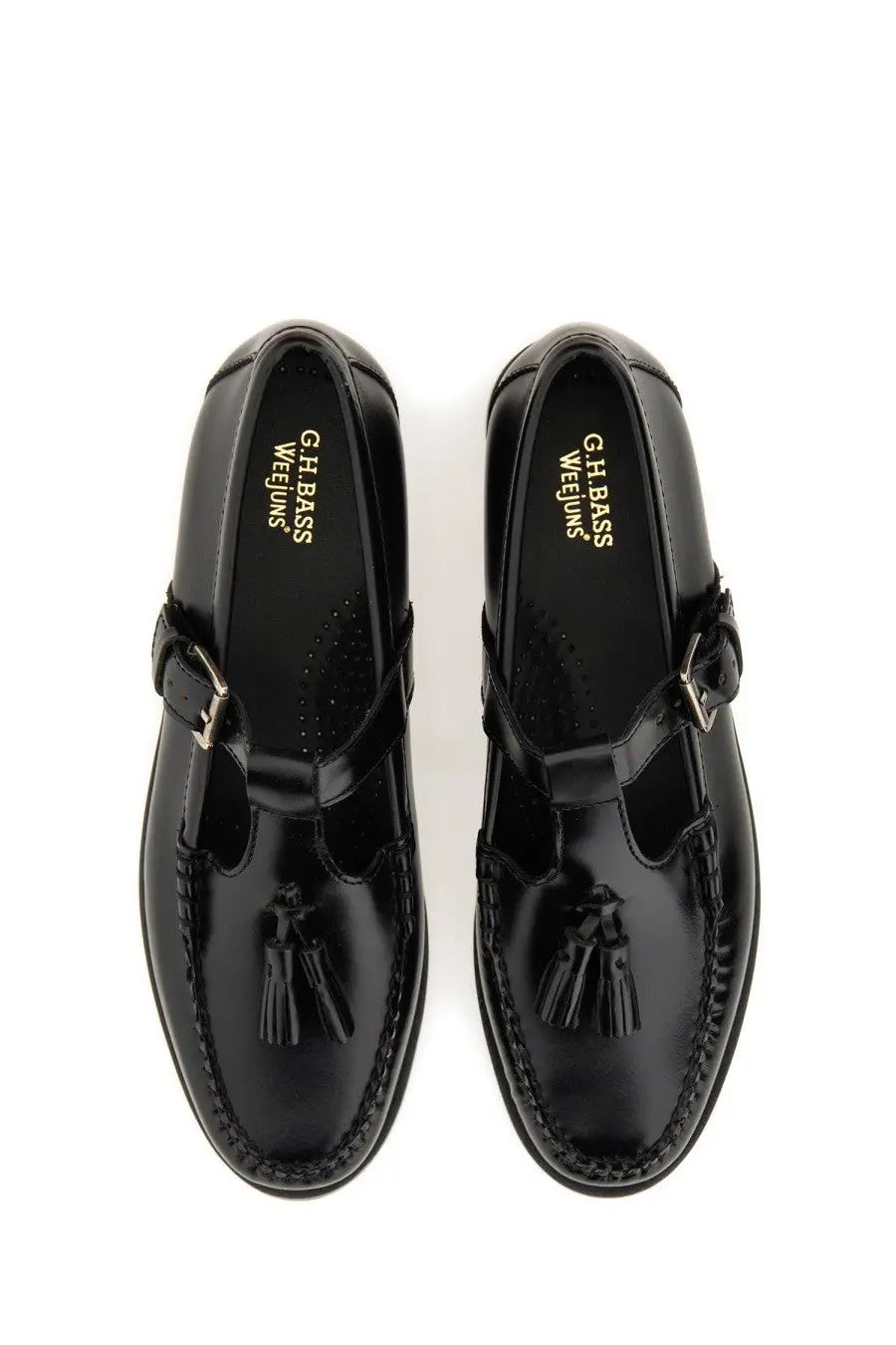 G.H. Bass women’s black patent leather Mary Jane loafer with tassels, buckle strap, and stitched detailing