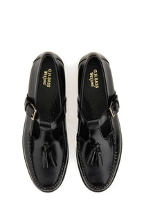 G.H. Bass women’s black patent leather Mary Jane loafer with tassels, buckle strap, and stitched detailing