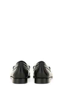 G.H. Bass women’s moccasin weejuns penny black black leather loafers with sleek polished finish and classic slip-on design