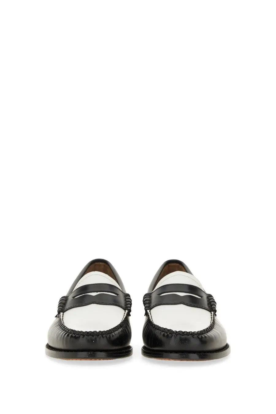 Black and white leather loafers with classic two-tone design from gh bass women’s moccasin weejuns penny black