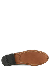 Tan leather sole with black rubber outsole and stitched detailing on gh bass women’s penny loafer black
