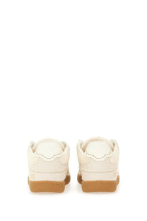 Ganni women’s canvas sneaker white in cream leather with tan rubber sole and subtle stitching details