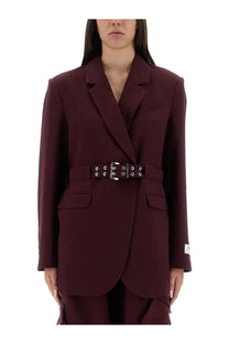 Ganni women’s red crepe blazer featuring a structured design with a wide maroon belt and silver-toned buckle