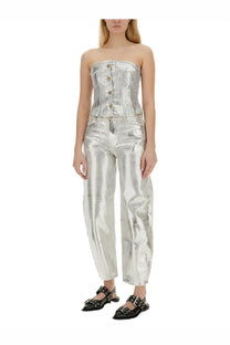 Silver metallic corset top with gold-tone buttons and matching shiny silver pants paired with ganni womens denim top white