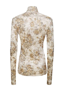 A fitted long-sleeved turtleneck top by ganni in soft cream with intricate muted gold and brown floral print