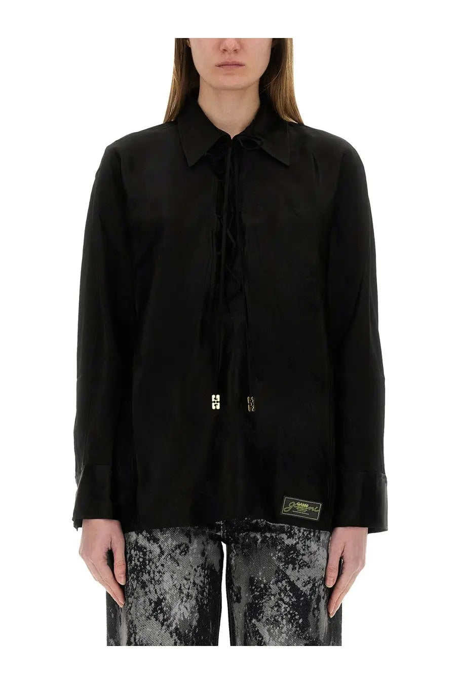 Ganni women’s jacquard satin black shirt with collar front tie detail and subtle gold logo patches on chest