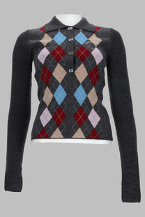 Dark gray argyle knit sweater with collar button closure featuring diamond patterns in red light blue beige and pale pink