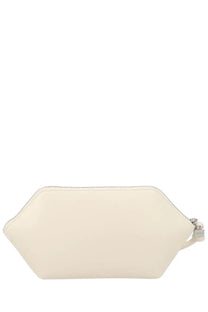 Cream-colored hexagonal leather clutch with minimalist design and silver-toned zipper pull for makeup storage