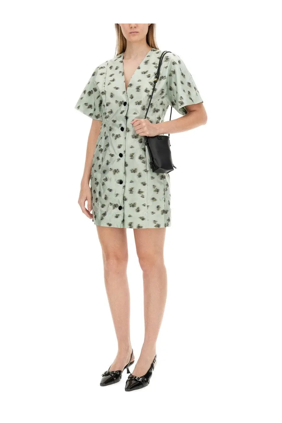 Ganni women’s mini dress in light green with black floral pattern short sleeves and button front closure