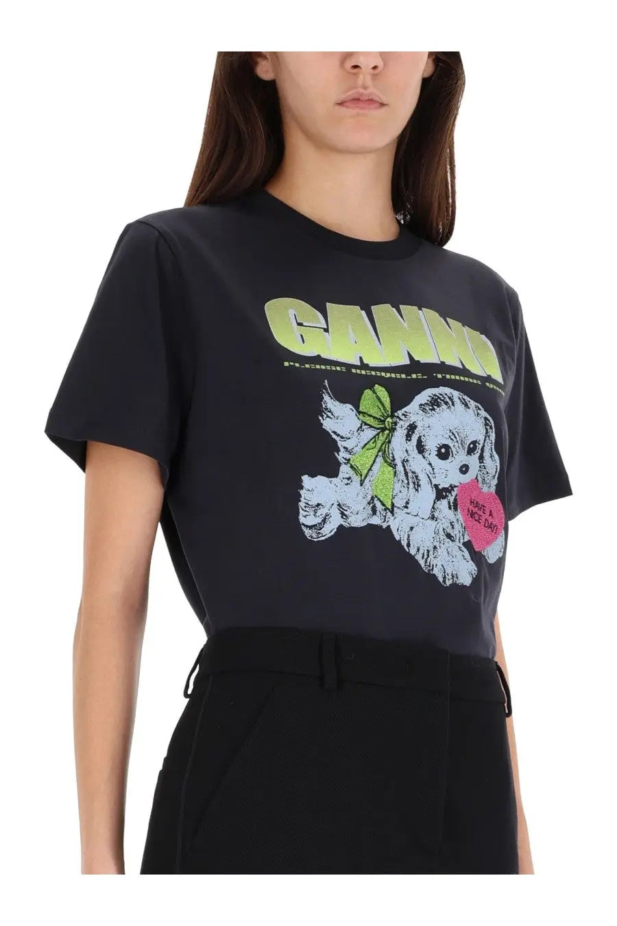Black cotton ganni women’s puppy shirt featuring a playful cartoon dog with green bow and pink heart in lime-green lettering