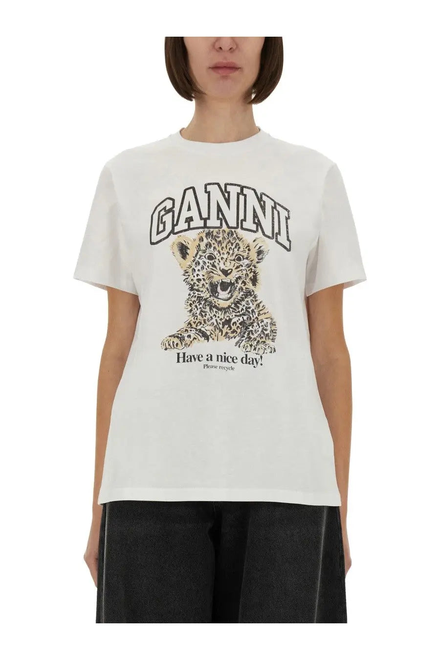 White ganni women’s shirt featuring a black and beige illustrated leopard cub graphic and have a nice day print