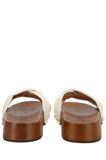 Ganni women’s zoccolo tia fairy white cream leather slide sandals with chunky brown wooden sole and silver studs