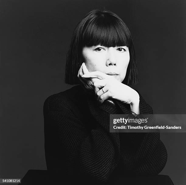 Black textured knit sweater by Rei Kawakubo, tailored silhouette